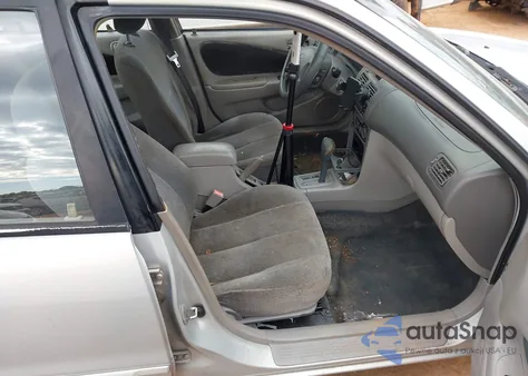 2001 Toyota Corolla Le z USA, uszkodzony, nr VIN 2T1BR12E71C507692